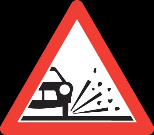 1.12 - Panneau routier Gravillons lâchés