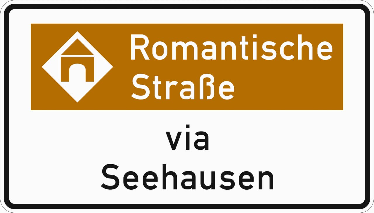 386.2-51 - Touristische Route - Hinweis mit Bezugsziel, Variante "via" Verkehrsschild