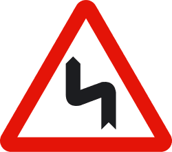 P-14b - Dangerous curves, first to the left road sign