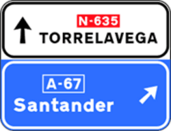 S-349a - Immediate Exit Sign with Side Panel on a Conventional or Multi-lane Road toward a Motorway or Dual Carriageway and the Current Direction road sign